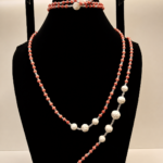 Coral Bead Necklace with Carved Rose Accents