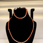 Coral Beaded Wrap Necklace with Charm