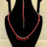 Coral Beaded Necklace with Rose Accents