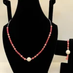 Coral Necklace with Carved Accent & Silver Chain