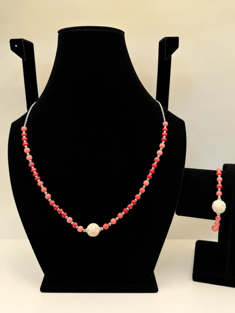 Coral Necklace with Carved Accent & Silver Chain