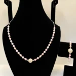 Peach Coral Necklace with Carved Rose Accents