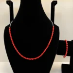 Coral Beaded Necklace with Silver Chain & Charm Detail